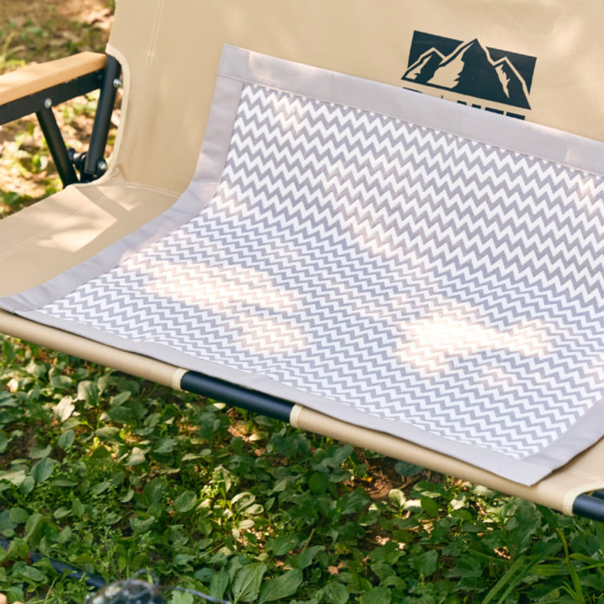 Dr's Carbon Heating Pad Medium on a camping bench | pad-m-sub-2026-09-30