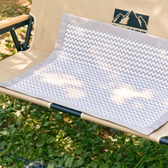 Dr's Carbon Heating Pad Medium on a camping bench | pad-m-sub-2026-09-30